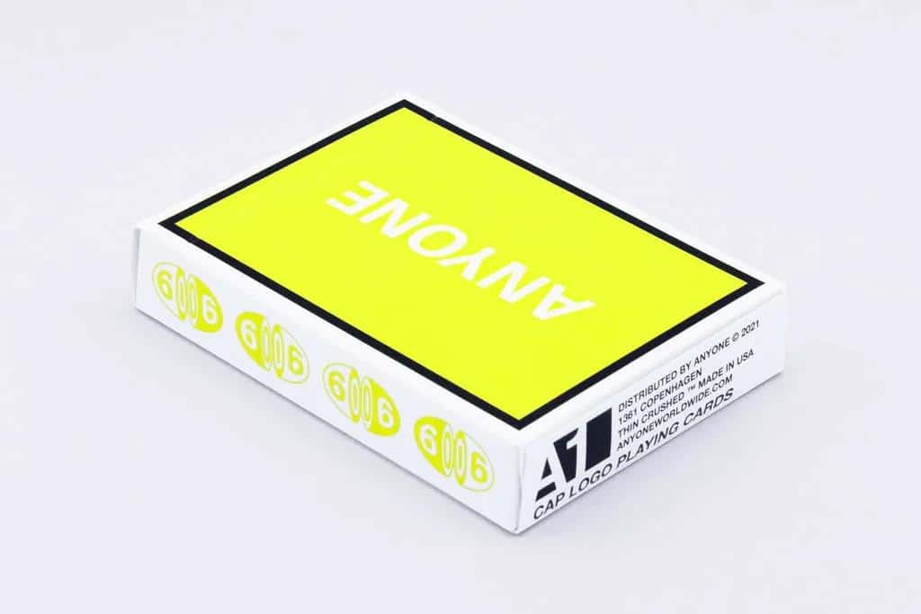 Anyone Worldwide: Neon Yellow Cap Logo Playing Cards