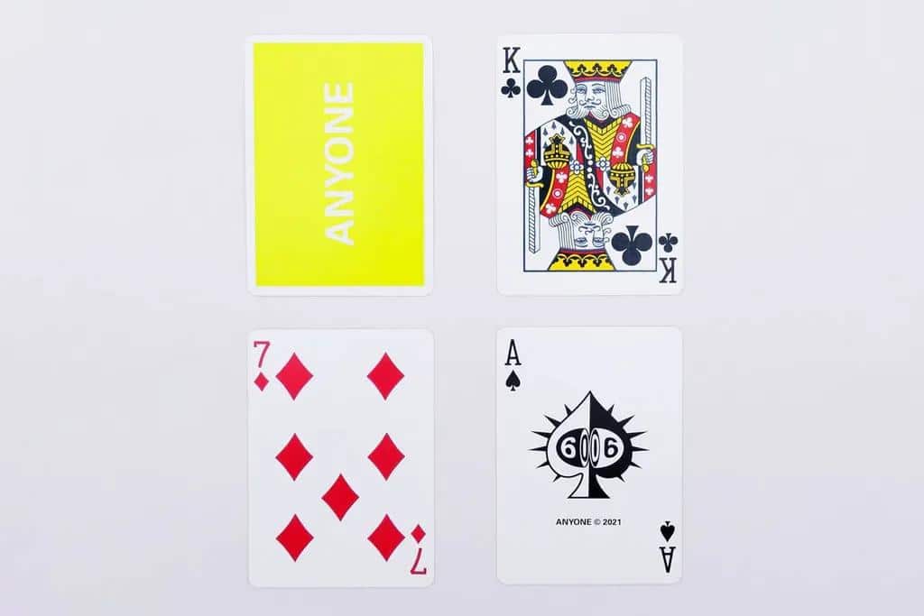 Anyone Worldwide: Neon Yellow Cap Logo Playing Cards