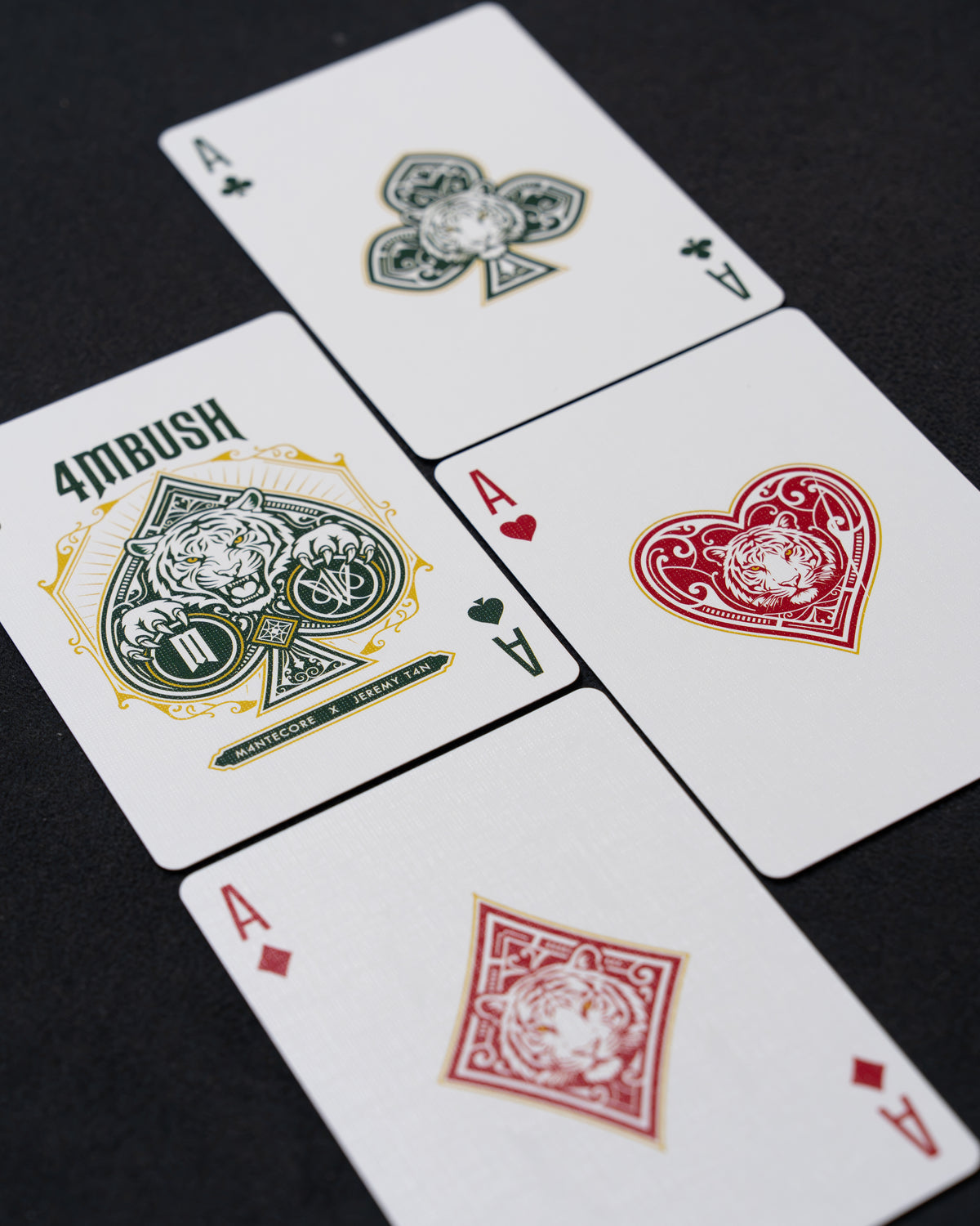 <p>Custom aces in all four suits, each with a tiger at its heart</p>