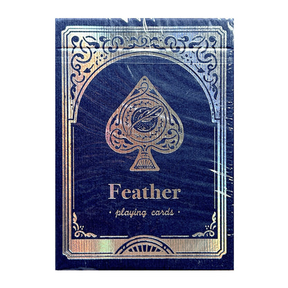 A sealed box of Feather Playing Cards featuring a dark navy blue cover with a metallic gold spade design and decorative border, wrapped in clear plastic.